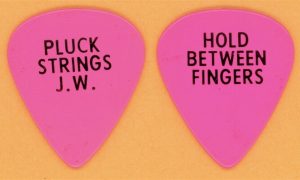 Eagles Joe Walsh 1982 You Bought It, You Name It Tour vintage guitar pick featuring official tour imprint.