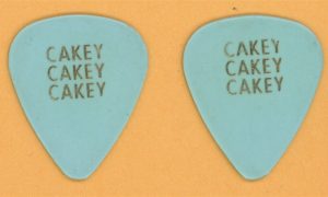 George Harrison 1979 tour guitar pick with CAKEY slogan Eric Clapton connection